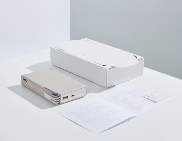 Illustrative G102Max power bank manufacturing documentation scene with packaging and technical specification materials