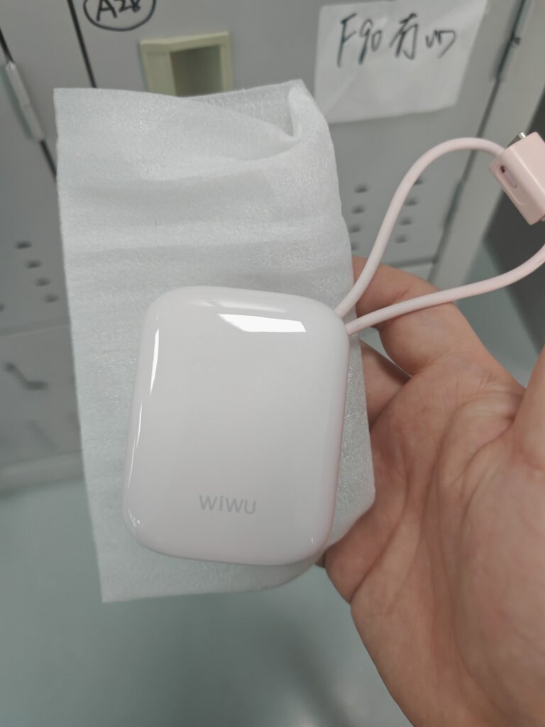 WIWU branded 10000mAh built-in cable power bank front view