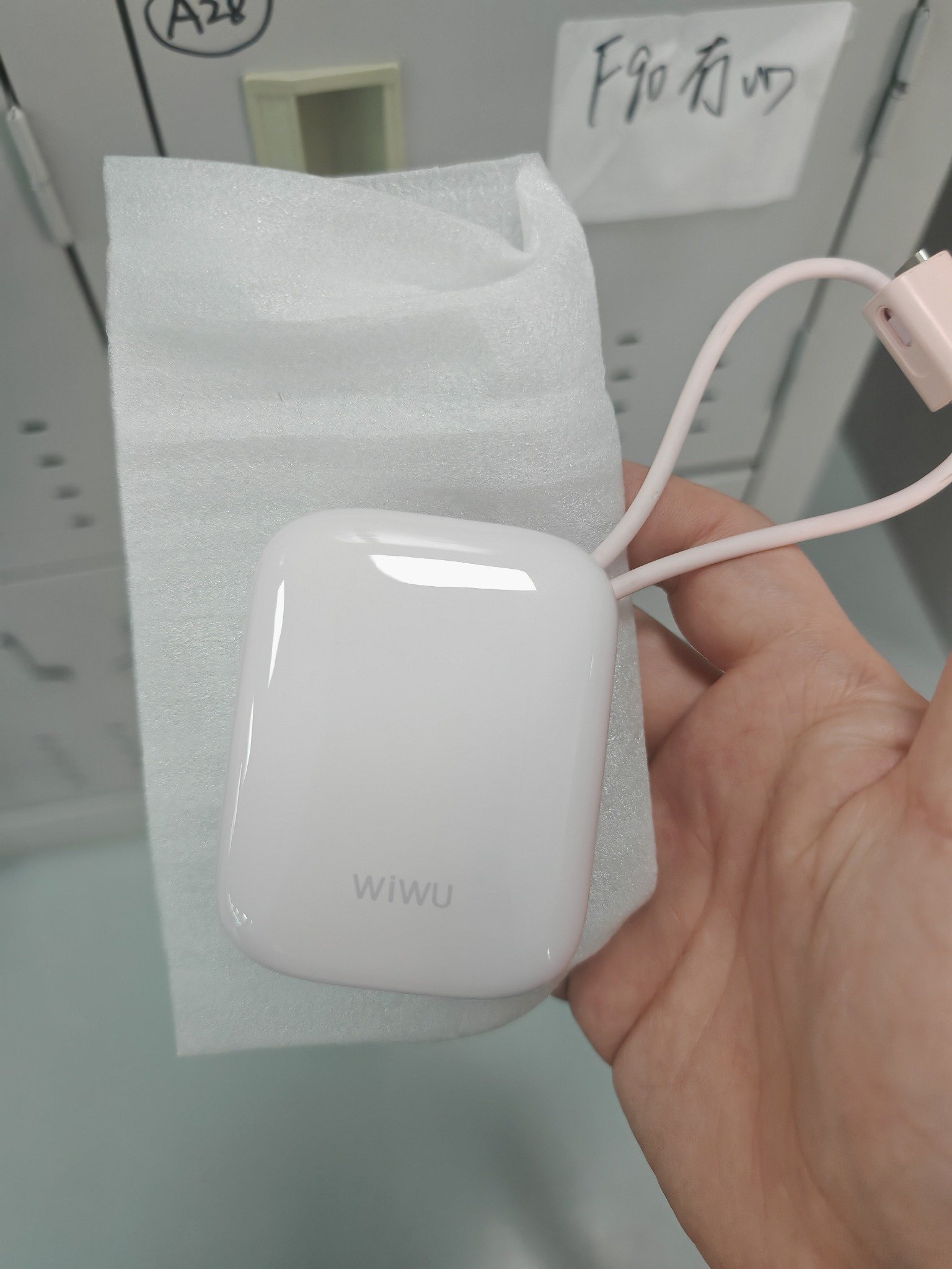 WIWU branded 10000mAh built-in cable power bank rear physical sample